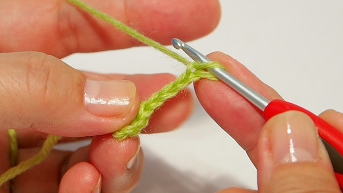 织3针，脱下并剪羊毛。